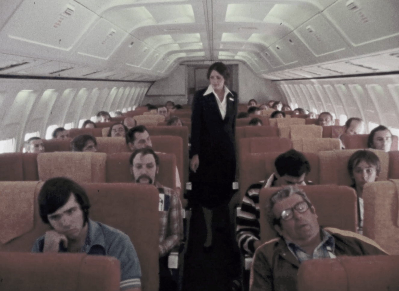 Quebecair Boeing 727-100 cabin view in 1978 airline promo film
