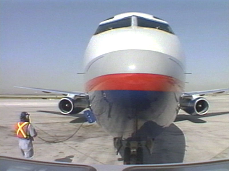 Canadian Airlines Boeing 737-200 being pushed back from the gate, circa early 1990s.