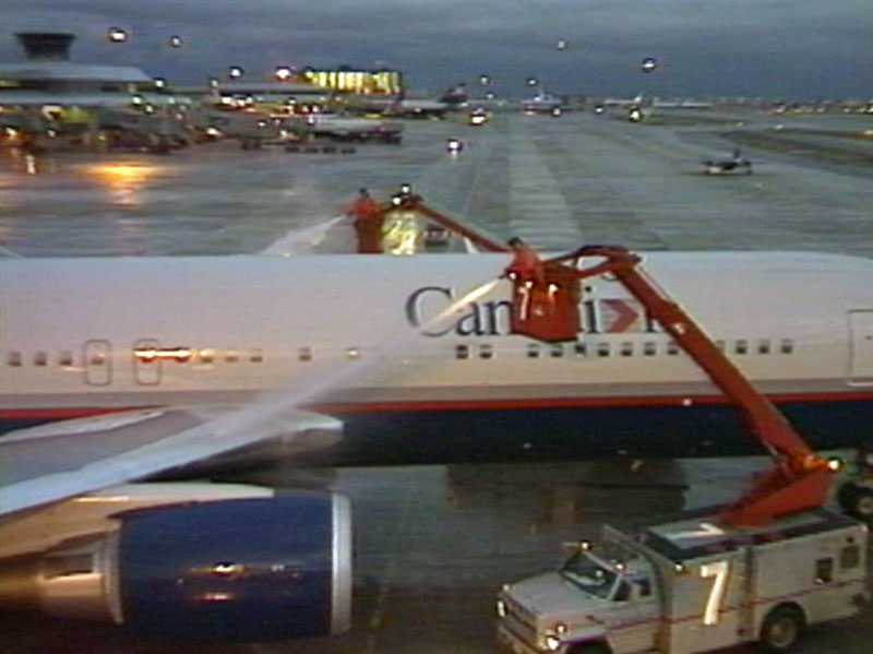 Canadian Airlines Boeing 767-300ER being de-iced at Toronto, early 1990s