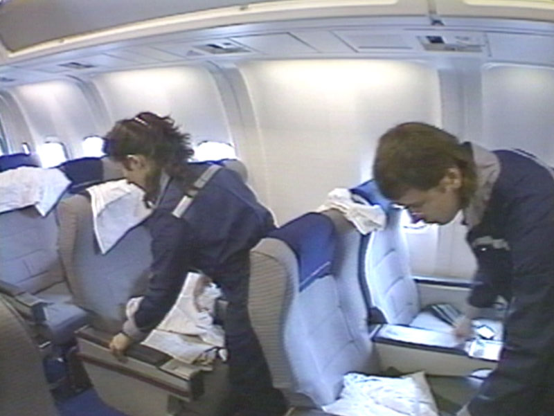 Canadian Airlines Boeing 767-300ER cabin being groomed for passengers, circa early 1990s