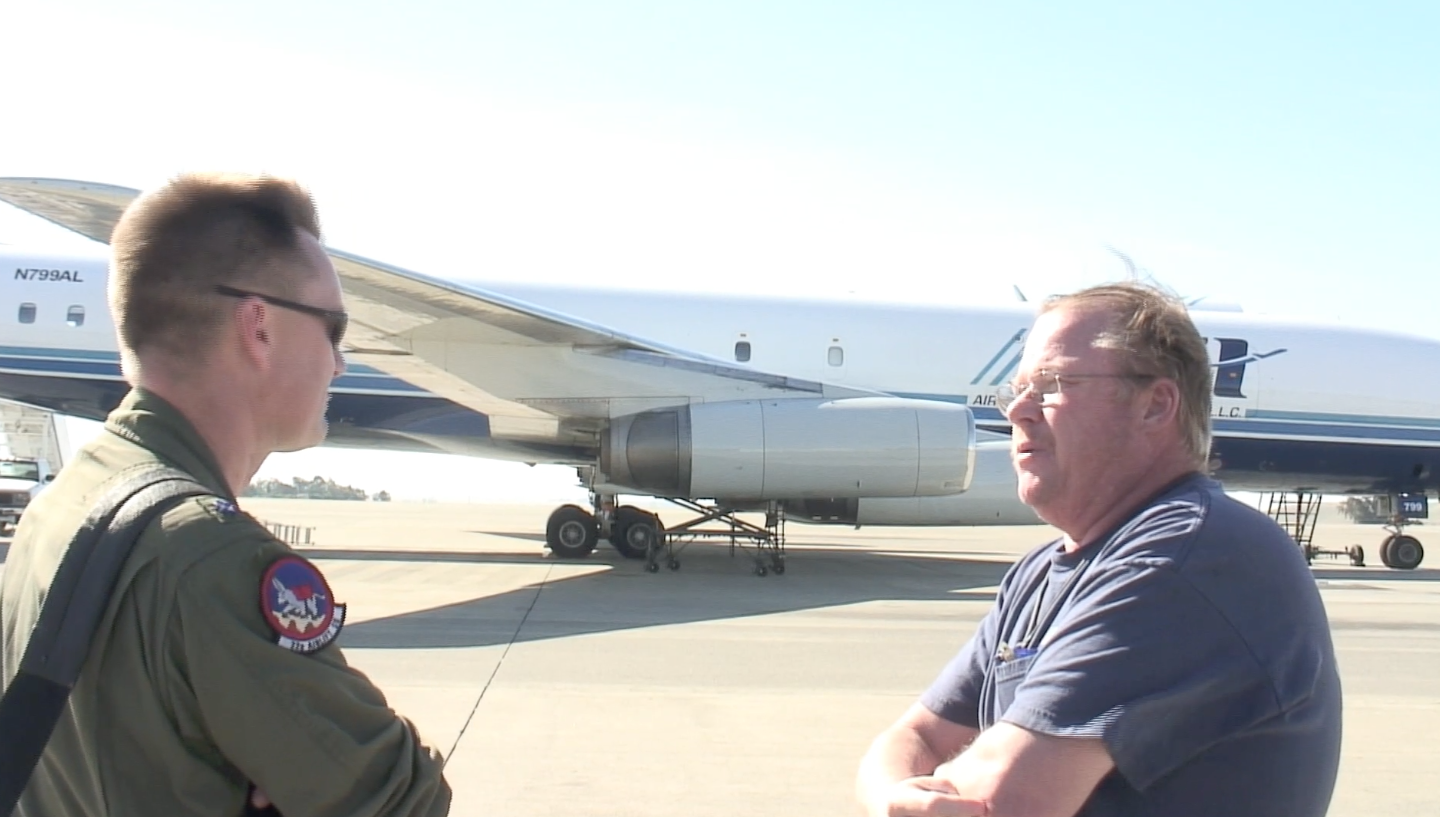 Lt. Col. Larry Suter and Bob Dobler on the ramp at Travis AFB with ATI DC-8-62 N799AL on May 12, 2013. This is a screenshot from the 9 episode mini series "DC-8 Farewell" that streams on the JetFlix TV streaming service for aviation super fans.