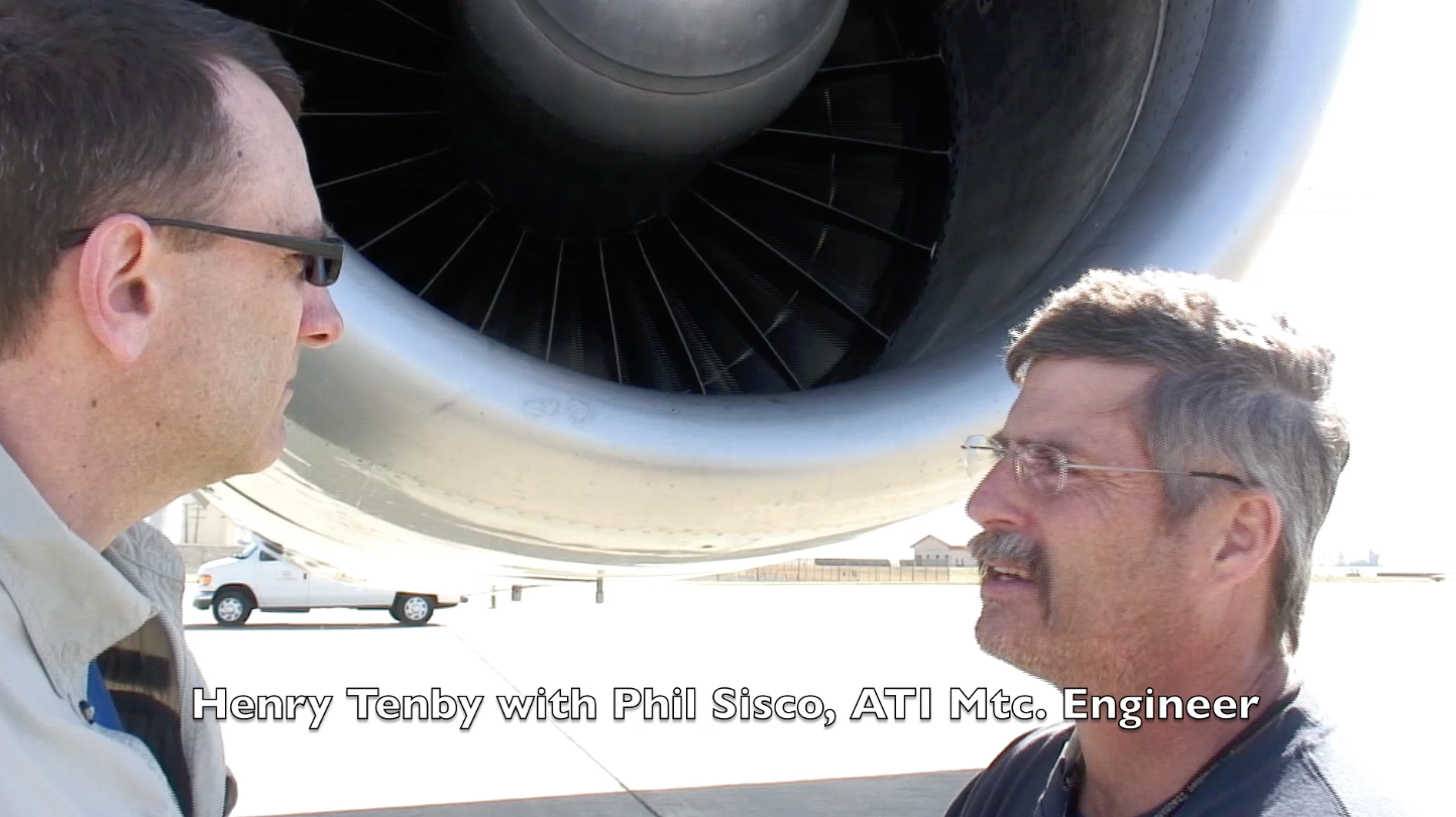 Henry Tenby talks with ATI Maintenance Engineer Phil Sisco about the JT3 intermix configuration of the ATI DC-8-62 N799AL on the ramp at Travis AFB on May 12, 2013. This is a screenshot from the 9 episode mini series "DC-8 Farewell" that streams on the JetFlix TV streaming service for aviation super fans.