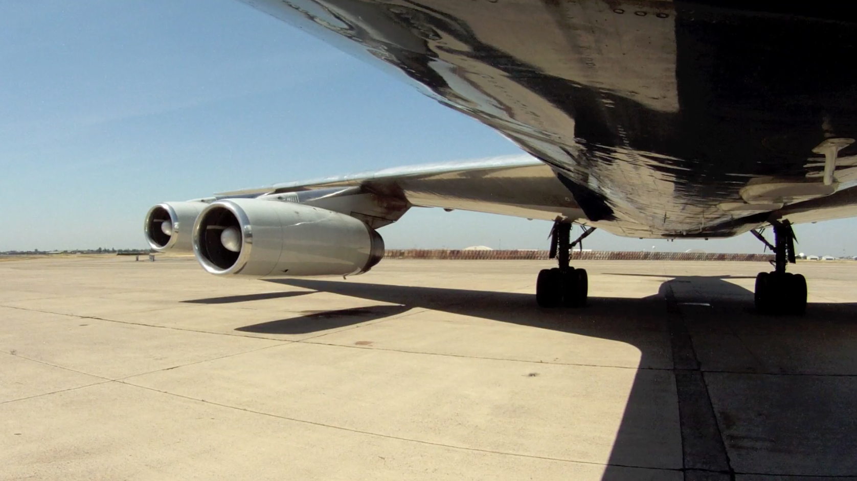 Wing view during JT3 engine start of ATI DC-8-62 N799AL for its final flight within the Continental United States at McClellan Airport on May 12, 2013. This is a screenshot from the 9 episode mini series "DC-8 Farewell" that streams on the JetFlix TV streaming service for aviation super fans.