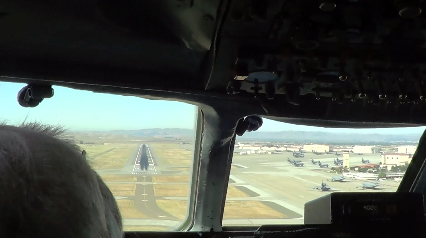 ATI DC-8-62 N799AL on very short finals to landing at Travis AFB inbound from McClellan Airport on May 12, 2013. Notice the ramps filled with USAF KC-10 tankers. This is a screenshot from the 9 episode mini series "DC-8 Farewell" that streams on the JetFlix TV streaming service for aviation super fans.