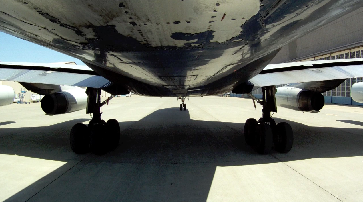 Rear looking forward view from the rear video camera attached to the ATI DC-8-62 N799AL at McClellan Airport on May 10, 2013, during live taxi and max power engine check on two of the JT3 engines. JetFlix TV's Henry Tenby filmed the entire event using multiple video camera on the flight deck, exterior of the aircraft and in the cabin viewing the wings and engines. The check was performed by ATI maintenance and engineers Robert Dobler and Phil Sisco. Two days later this aircraft was filmed on its flight to Travis AFB. This is a screenshot from the 9 episode mini series "DC-8 Farewell" that streams on the JetFlix TV streaming service for aviation super fans.