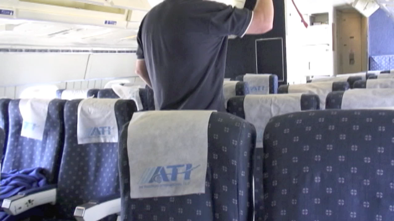 Passenger cabin view of ATI DC-8-62 N799AL at McClellan Airport on May 10, 2013, prior to taxi and engine tests done that same day. This is a screenshot from the 9 episode mini series "DC-8 Farewell" that streams on the JetFlix TV streaming service for aviation super fans.